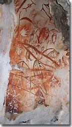Ancient rock paintings near Misool Eco Resort. Raja Ampat, West Papua, Indonesia.