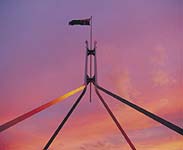Australian Flag flying above Parliament House - Photo courtesy of Tourism NSW